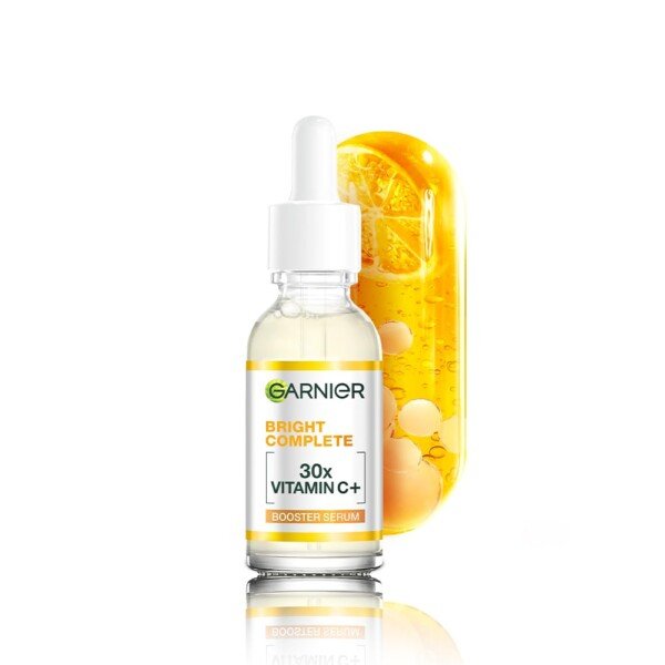 Vitamin C serum Garnier 30ml travel size bottle with niacinamide salicylic acid for brightening dark spots acne marks
